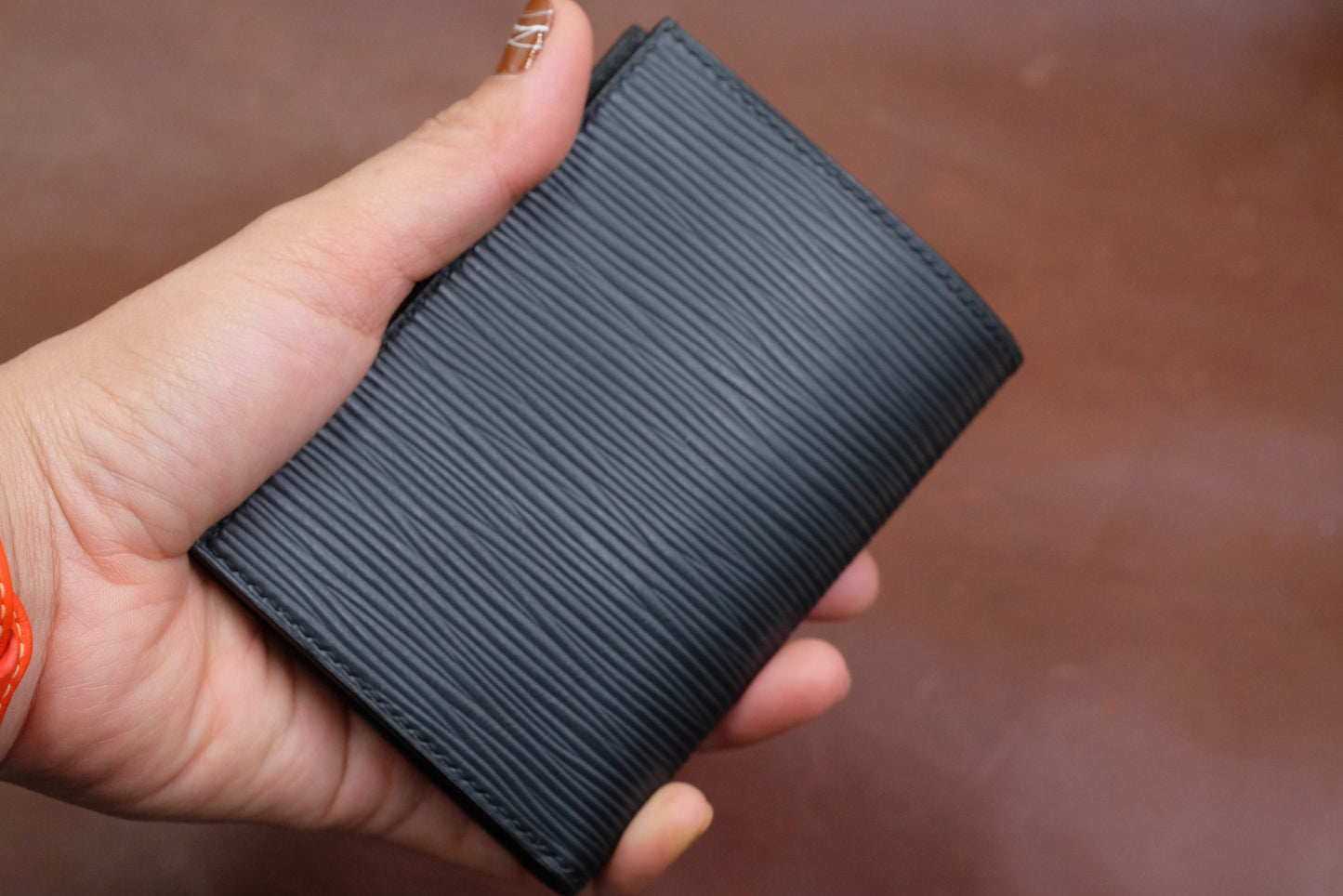 Black epi leather vertical bifold wallet HDWA53