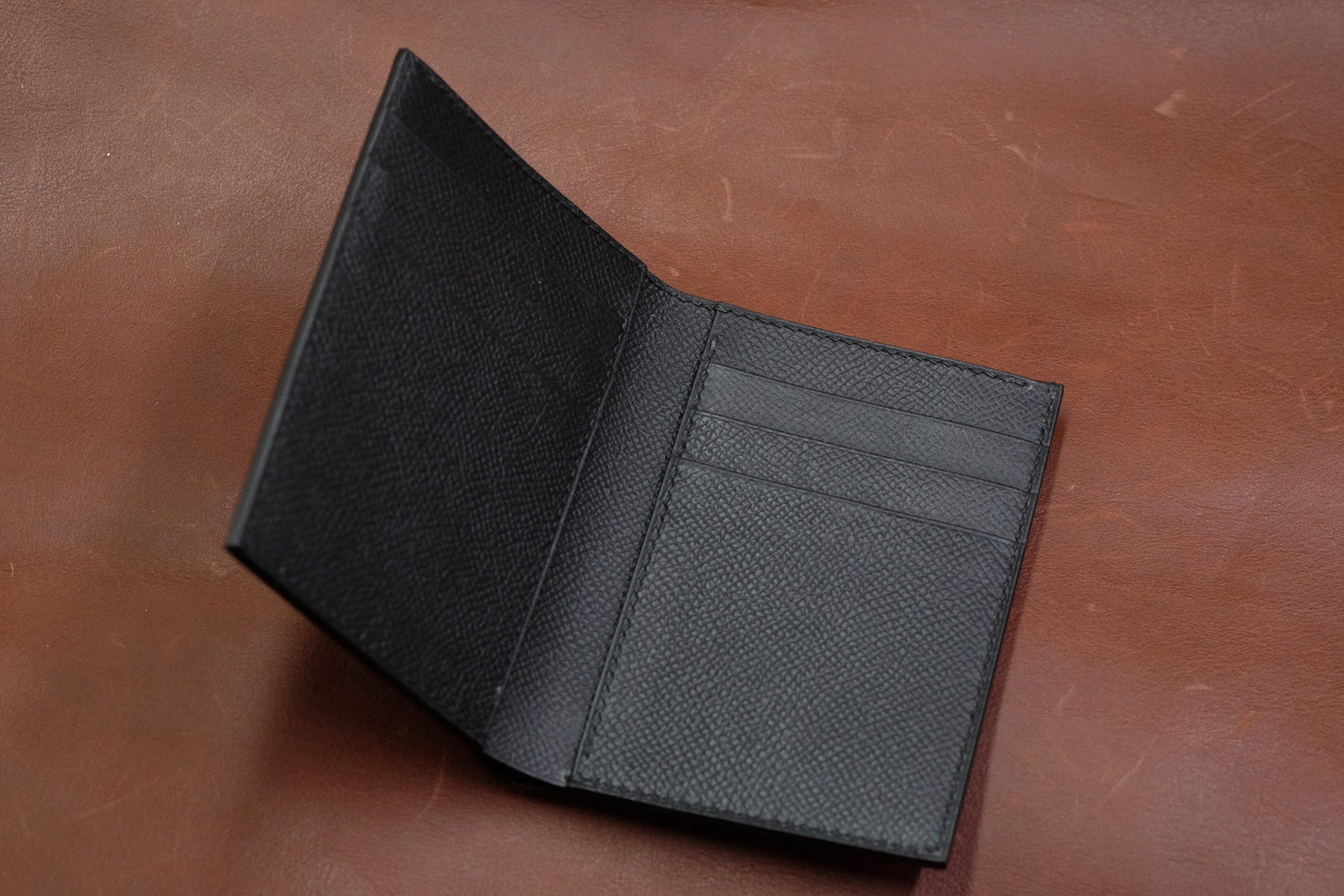 Black epi leather vertical bifold wallet HDWA53