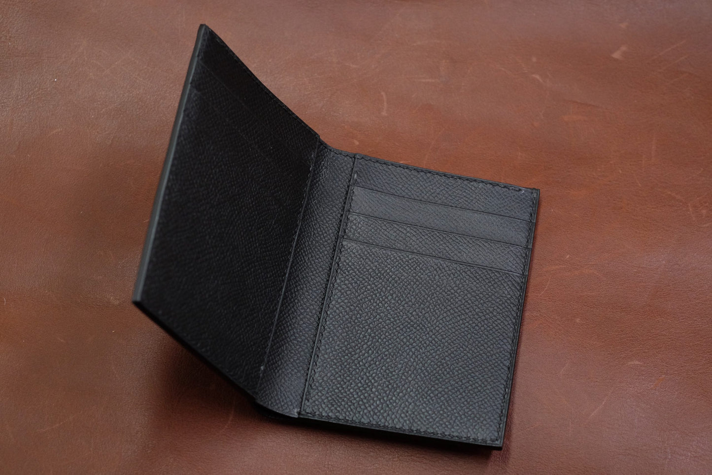 Black epi leather vertical bifold wallet HDWA53