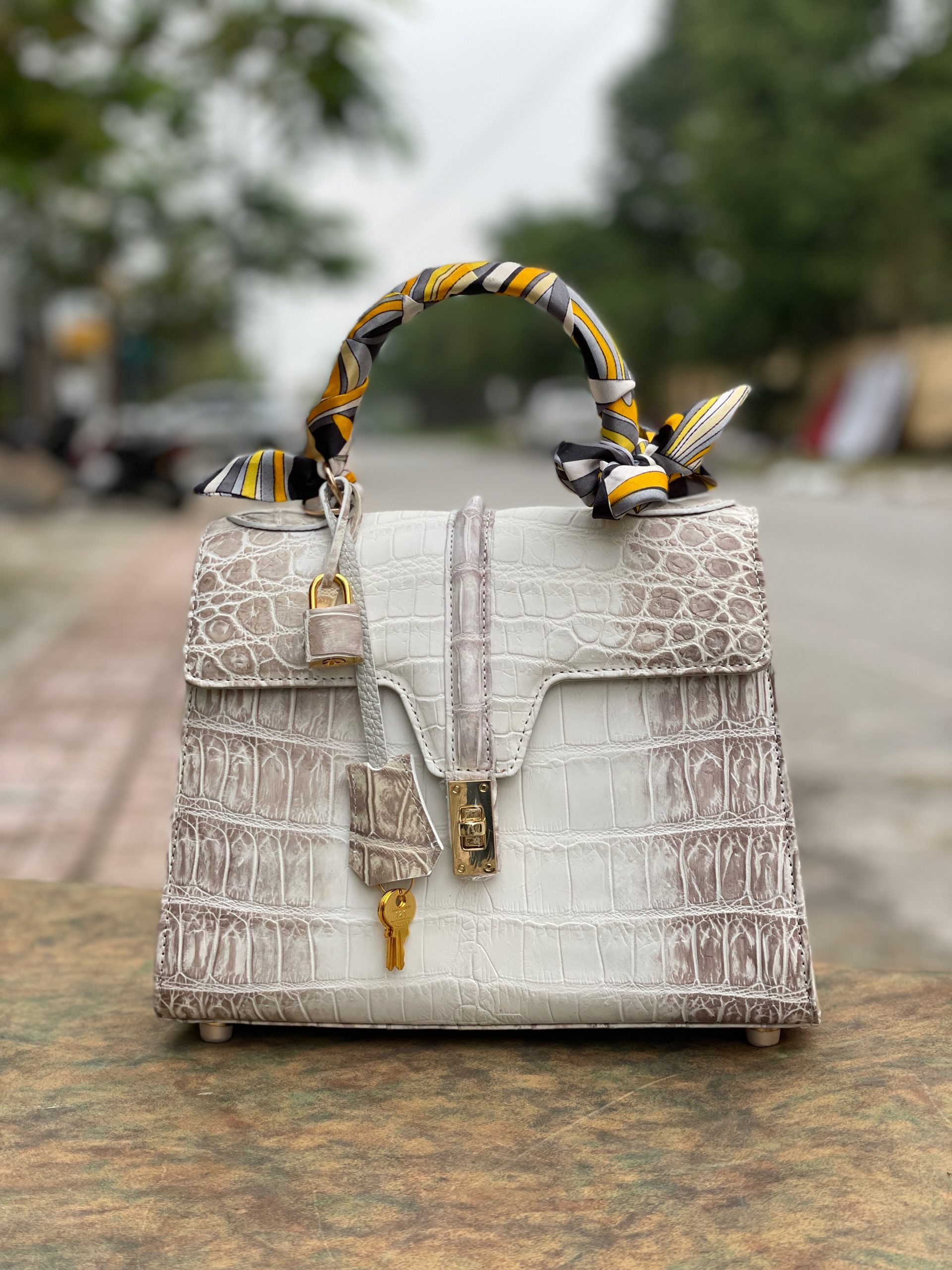 Bespoke himalayan crocodile handmade handbag with gold plated